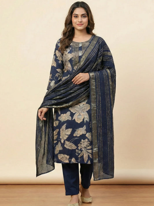 Indian model elegantly draped in a navy blue ethnic suit featuring a gold-striped zari dupatta and botanical leaf prints
