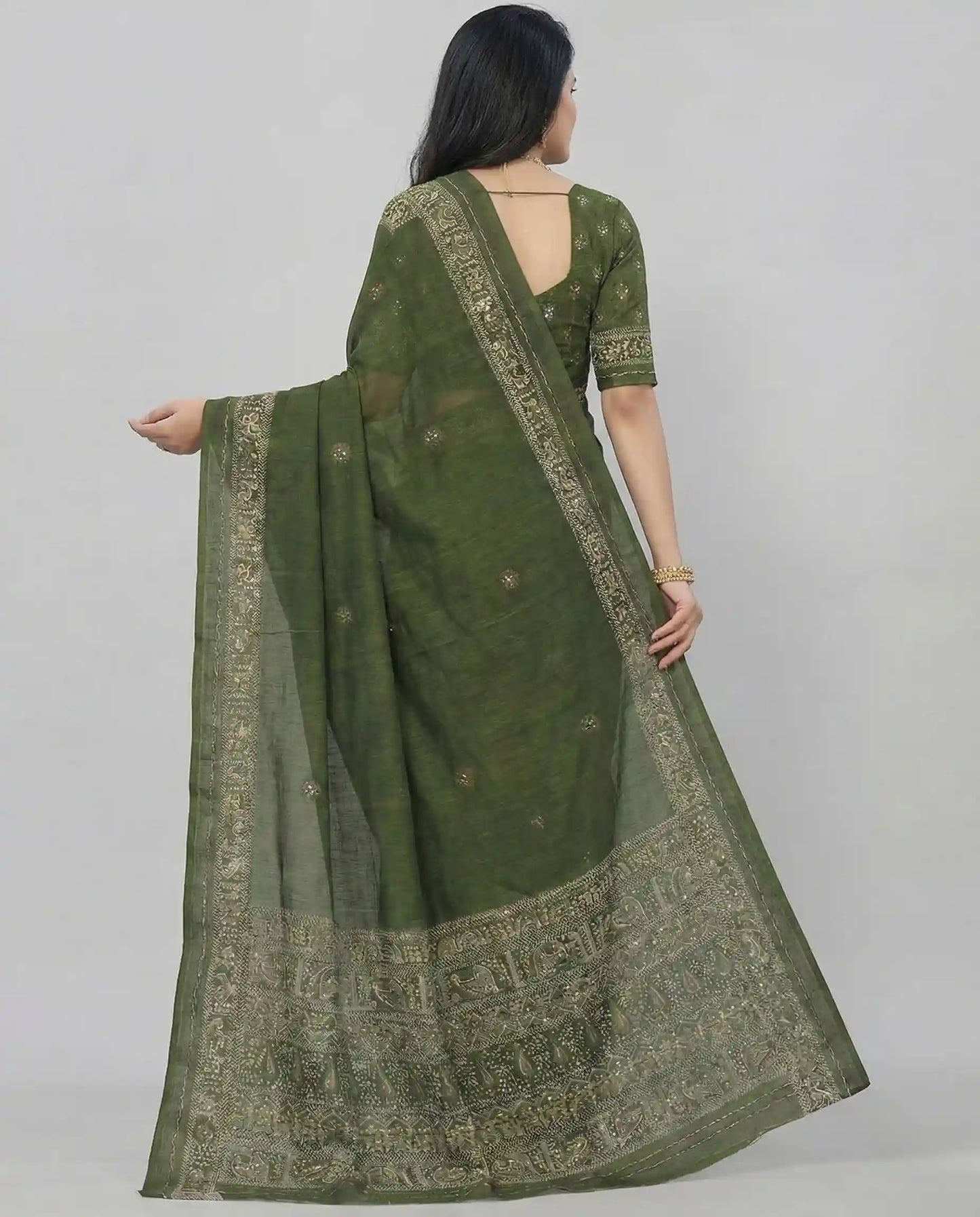 Back view of the olive green saree highlighting the detailed pallu design and the matching blouse with traditional sleeve borders.