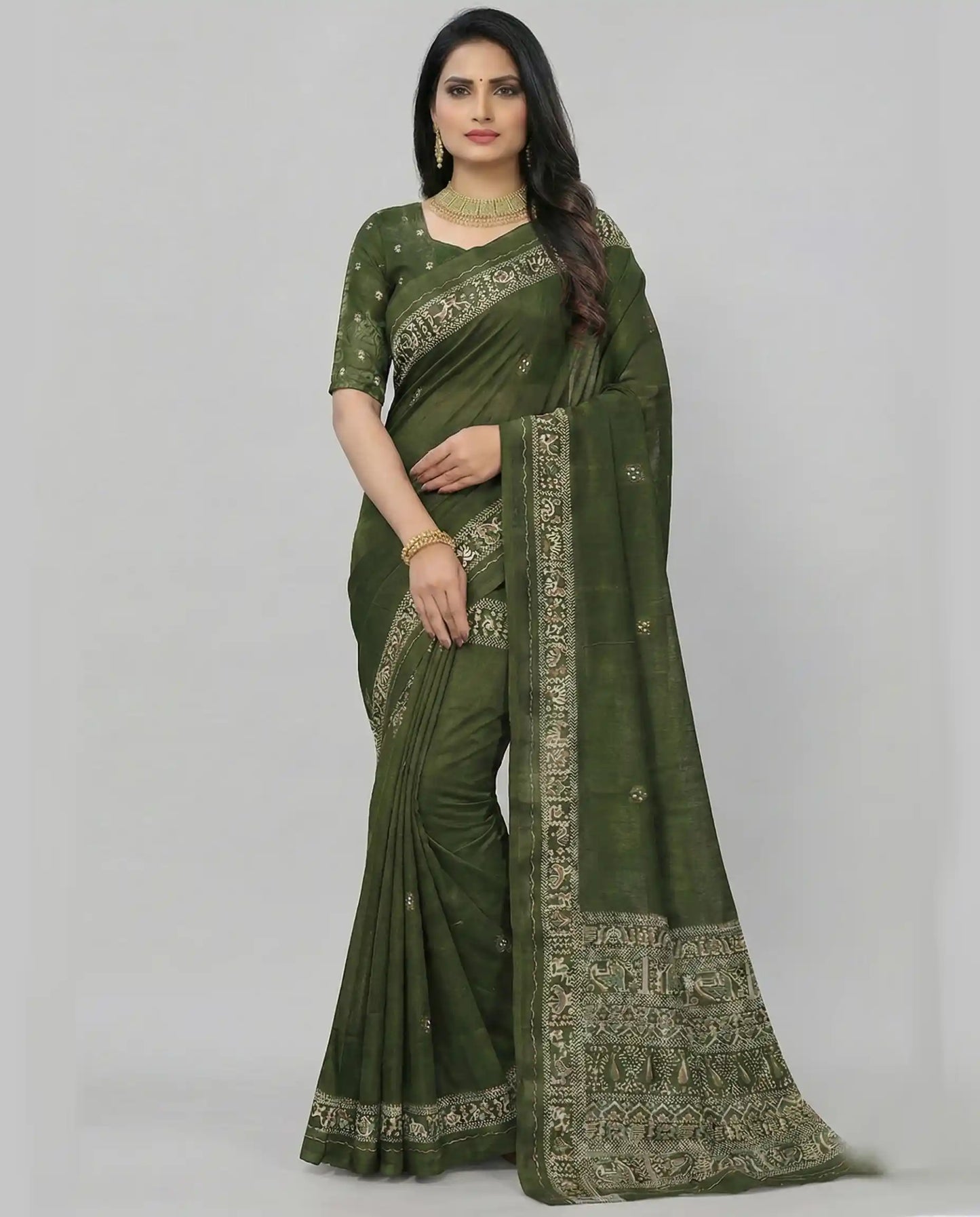 Full-length front view of a model wearing a Sherly's Attire olive green traditional saree featuring intricate cream elephant motifs and a decorative border.