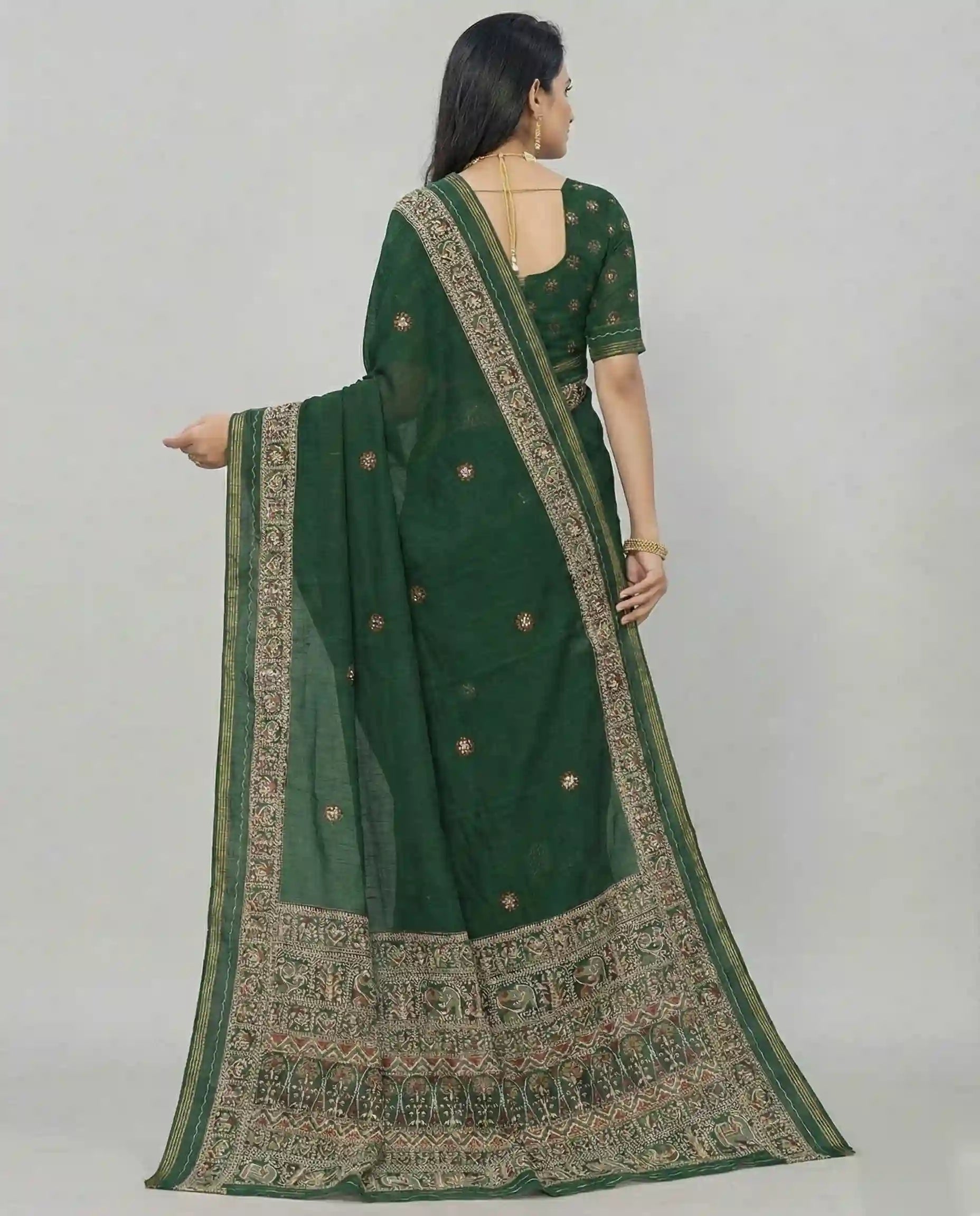 Back view of a dark green Jodhpuri cotton saree highlighting the intricate pallu design and blouse back.